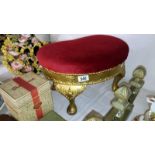 A gilded kidney shaped footstool