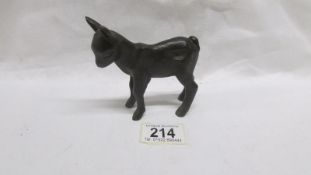 A bronze lamb signed F.K.