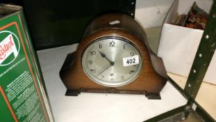 An oak mantel clock