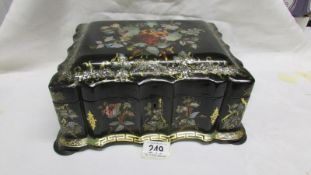 A beautiful papier mache' Victorian black lacquer work box decorated with mother of pearl,