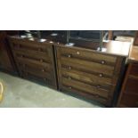 A pair of dark oak 4 drawer chests