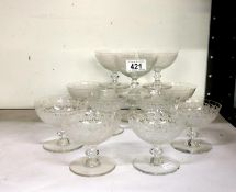 A set of 12 etched glass dessert dishes