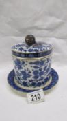 A 19th century Ridgways blue and white lidded jar with lozenge mark,