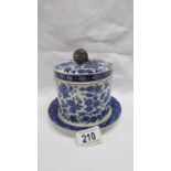 A 19th century Ridgways blue and white lidded jar with lozenge mark,