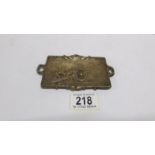 A bronze first world war dish (11cm long) marked 'Un Vrat poilu Notre 75 En Action'