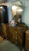 A Victorian serpentine front walnut veneered mirror back 3 drawer chest