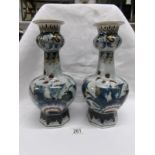 A pair of large Delft vases