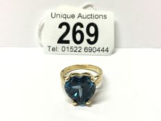 A 9ct large heart shaped topaz ring