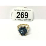 A 9ct large heart shaped topaz ring