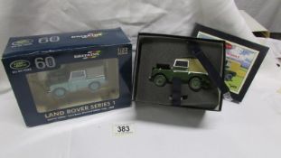 2 boxed Britain's Land Rover series 1,