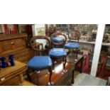 A set of 4 mahogany balloon back dining chairs