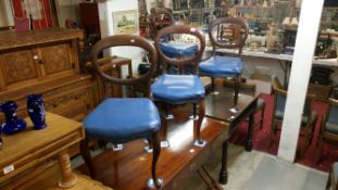 A set of 4 mahogany balloon back dining chairs