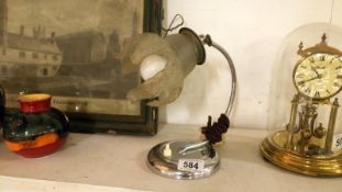 A chrome art deco table lamp