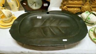 A very large early 19th century pewter hot plate with 2 carrying handles,