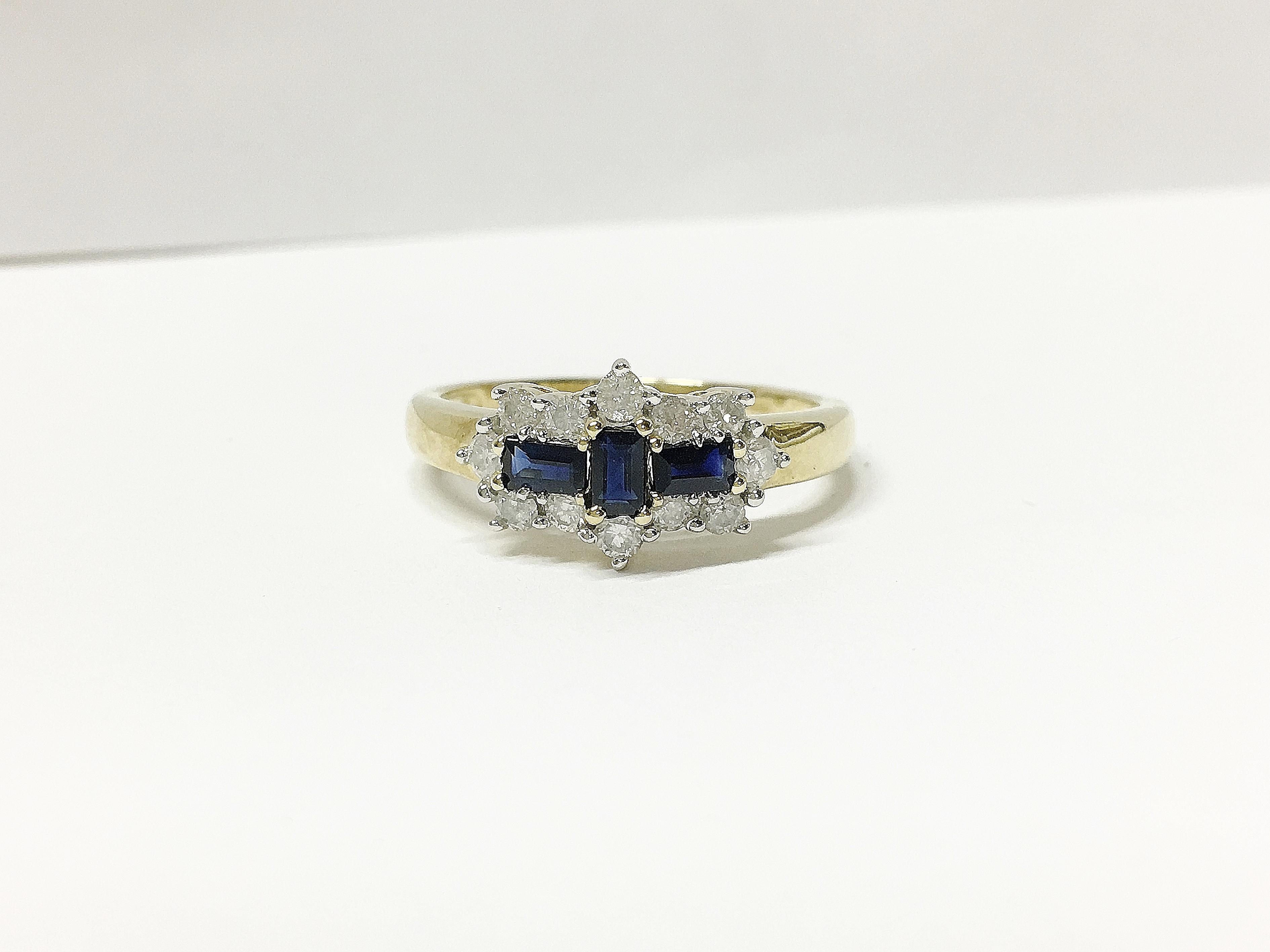 A yellow gold baquette sapphire and diamond ring - Image 2 of 3