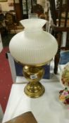 A table oil lamp with brass base