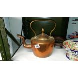 A 19th century copper kettle