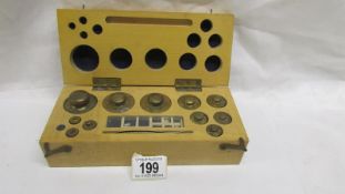 A boxed set of Griffin George Limited brass postal scale weights