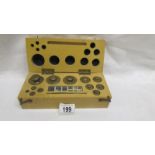 A boxed set of Griffin George Limited brass postal scale weights