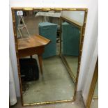 A bamboo effect gilt framed mirror