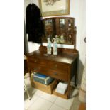 A mahogany inlaid dressing table