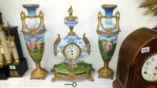 A 3 piece ceramic clock set