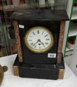 A black slate mantel clock