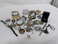 A box of assorted watches including silver pocket watch,