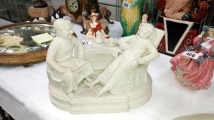 A 19th Century porcelain study of Monks having refreshments