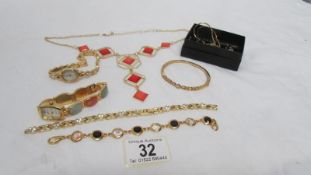 A mixed lot of jewellery including 2 ladies wristwatch, necklace with matching earrings,