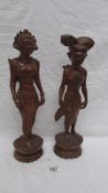 2 carved wood oriental figures