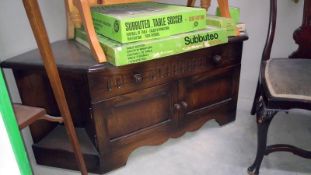 An oak corner cupboard