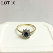 A diamond and sapphire cluster ring in 9ct gold,