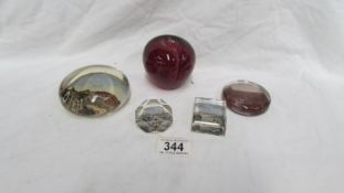 4 souvenir paperweights & 1 other