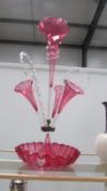 A cranberry glass epergne