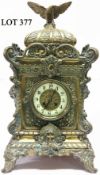 A 24" brass mantel clock