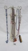 A necklace stand and necklaces