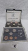 A 1987 proof coin set and a set of Isle of Man decimal coins