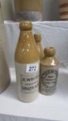 A quantity of stoneware Advertising bottles