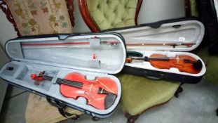 2 modern violins with cases