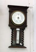 A 1930's oak aneroid barometer