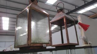 A pair of heavy copper lanterns