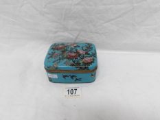 A blue floral cloisonne box