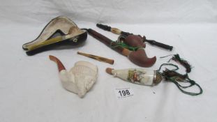 4 vintage pipes and a cheroot holder