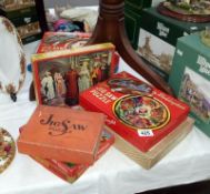 A quantity of vintage jigsaw puzzles
