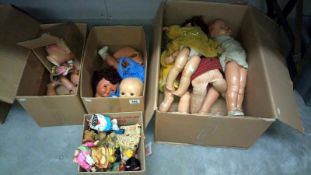 A quantity of dolls including boxed Rexard and dolls requiring re stringing