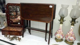 A mahogany cross banded Sutherland table