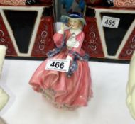 An unusual coloured Royal Doulton figurine 'Top O'The Hill'