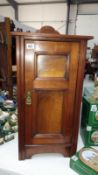 A mahogany pot cupboard