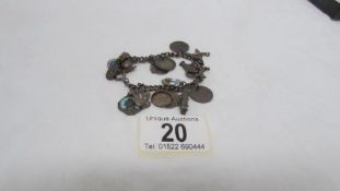 An early 20th century charm bracelet
